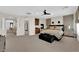 Spacious main bedroom with elegant decor, fireplace, and natural light, creating a luxurious and inviting space at 6739 Quapaw St, Las Vegas, NV 89149