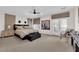 Large main bedroom with decorative wall accents, ceiling fan, and natural light, creating a relaxing retreat at 6739 Quapaw St, Las Vegas, NV 89149