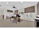 Bright home office featuring a large desk, neutral decor, and natural light, ideal for a productive workspace at 6739 Quapaw St, Las Vegas, NV 89149