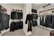 Organized walk-in closet with ample hanging space and shelving for clothes and accessories at 6739 Quapaw St, Las Vegas, NV 89149