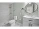Modern bathroom featuring a walk-in shower, a vanity, and neutral tones at 728 Carpenter Dr, Las Vegas, NV 89107