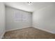 Neutral bedroom with a window and carpeted floor at 728 Carpenter Dr, Las Vegas, NV 89107