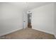 Neutral bedroom with a door ajar and a carpeted floor at 728 Carpenter Dr, Las Vegas, NV 89107