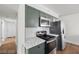 A stylish kitchen is showcased with stainless steel appliances, modern cabinetry, and elegant countertops at 728 Carpenter Dr, Las Vegas, NV 89107