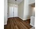 Bright entryway features new floors, fresh paint, and double entry doors at 8010 Coffee Tree Ct, Las Vegas, NV 89123