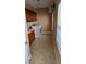 Laundry room with tile floors, cabinets, and modern washer/dryer at 8159 Base Camp Ave, Las Vegas, NV 89178
