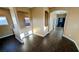 Spacious living area with wood-look flooring and neutral paint at 8159 Base Camp Ave, Las Vegas, NV 89178