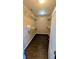 Walk-in closet with built-in shelving and hardwood floors at 8159 Base Camp Ave, Las Vegas, NV 89178