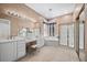 Bright primary bathroom features a separate glass shower, a soaking tub, and double vanity sink at 835 Market Crest Dr, Las Vegas, NV 89110