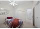Bright bedroom with large mirror and built-in storage under the bed and ceiling fan at 835 Market Crest Dr, Las Vegas, NV 89110