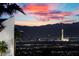 Stunning night view of the city skyline and mountains at 835 Market Crest Dr, Las Vegas, NV 89110