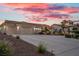 Charming single-story home with a spacious driveway and desert landscaping at 835 Market Crest Dr, Las Vegas, NV 89110