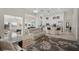 Open-concept living space with views of the kitchen and a comfortable seating area at 835 Market Crest Dr, Las Vegas, NV 89110