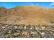 Picturesque neighborhood nestled against the backdrop of majestic mountains, offering a serene and scenic living environment at 835 Market Crest Dr, Las Vegas, NV 89110