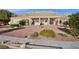 A charming single-story home with desert landscaping in the backyard and mountain views at 835 Market Crest Dr, Las Vegas, NV 89110