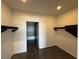 Walk-in closet features shelving and leads to a bathroom with a soaking tub at 900 Las Vegas Blvd # 1003, Las Vegas, NV 89101