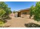 Low maintenance backyard featuring gravel and shade trees for outdoor living and relaxation at 9025 Rusty Rifle Ave, Las Vegas, NV 89143