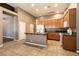 Well-appointed kitchen with a center island, ample counter space, and modern appliances at 9025 Rusty Rifle Ave, Las Vegas, NV 89143