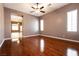 Spacious living room featuring hardwood floors, natural light, and an open layout at 9025 Rusty Rifle Ave, Las Vegas, NV 89143