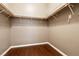 Walk-in closet with hardwood floor and wire shelving at 9025 Rusty Rifle Ave, Las Vegas, NV 89143