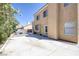 Backyard featuring a covered patio and a gravel area with a fire pit and patio seating at 9428 Sierra Summit Ave, Las Vegas, NV 89134