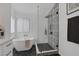 Beautiful bathroom featuring a soaking tub and glass-enclosed shower at 9428 Sierra Summit Ave, Las Vegas, NV 89134