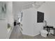 Bright entryway featuring white walls, a staircase, and decor that creates a welcoming ambiance at 9428 Sierra Summit Ave, Las Vegas, NV 89134