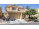 Charming two-story home with a neutral stucco exterior and a well-maintained front yard at 9428 Sierra Summit Ave, Las Vegas, NV 89134
