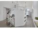 Bright room showcasing staircase access, modern decor, and natural light at 9428 Sierra Summit Ave, Las Vegas, NV 89134