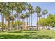 Community park featuring a gazebo with palm trees in a green grass area at 9428 Sierra Summit Ave, Las Vegas, NV 89134