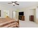Comfortable main bedroom with a view of the en-suite bathroom and walk-in closet at 9785 Turtle Head Ct, Las Vegas, NV 89117