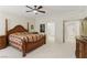 Well-lit main bedroom with a view of the en-suite bathroom and walk-in closet at 9785 Turtle Head Ct, Las Vegas, NV 89117