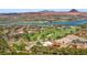 A vibrant lakeside community, nestled amidst lush greenery with a golf course and luxurious homes at 1 Costa Del Sol Ct, Henderson, NV 89011