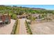 A luxurious residence on a generous lot with a paved driveway lined with trees at 1 Costa Del Sol Ct, Henderson, NV 89011