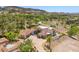 Expansive aerial view of a luxurious residence with landscaped grounds and scenic surroundings at 1 Costa Del Sol Ct, Henderson, NV 89011