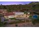 Captivating aerial view showcases the elegant estate with a pool, patios, and meticulously landscaped grounds at 1 Costa Del Sol Ct, Henderson, NV 89011