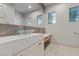 A modern bathroom features a stylish glass sink and wood toned drawers at 1 Costa Del Sol Ct, Henderson, NV 89011