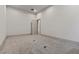 Spacious bedroom with neutral carpeting, large baseboards, and light gray walls at 1 Costa Del Sol Ct, Henderson, NV 89011