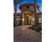 Stunning home entrance with stone accents, manicured landscaping and a welcoming feel at 1 Costa Del Sol Ct, Henderson, NV 89011