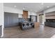 Sleek kitchen with a large island, gas cooktop, stainless steel appliances, and lots of storage at 1 Costa Del Sol Ct, Henderson, NV 89011