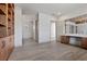 Office space view to attached bathroom. Built-in bookshelves and natural light at 1 Costa Del Sol Ct, Henderson, NV 89011