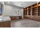 Bright office space with custom built-ins, a large desk, and natural light at 1 Costa Del Sol Ct, Henderson, NV 89011
