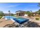 Beautiful backyard showcasing a sleek pool and integrated spa, perfect for outdoor relaxation and enjoyment at 1 Costa Del Sol Ct, Henderson, NV 89011