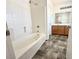 Bathroom features a tub/shower combo and vanity at 10381 Poker Alice Ct, Las Vegas, NV 89129