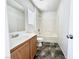 Clean bathroom featuring a tub/shower combination and vanity sink at 10381 Poker Alice Ct, Las Vegas, NV 89129