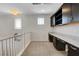 Functional loft space with built-in shelving, desk area, and ample natural light at 10433 Ember Rose Ave, Las Vegas, NV 89135