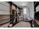 Spacious walk-in closet with custom shelving and ample storage space at 10433 Ember Rose Ave, Las Vegas, NV 89135