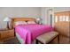 Cozy bedroom with hardwood floors, warm lighting, and a serene atmosphere at 10720 Bennington Ct, Las Vegas, NV 89134