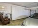 Spacious garage featuring floor-to-ceiling storage cabinets and parking for a car, along with ample room for organizing at 10720 Bennington Ct, Las Vegas, NV 89134