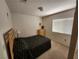 Cozy bedroom featuring a queen bed, neutral carpet, and a bright window at 10968 Geyser Peak St, Henderson, NV 89052